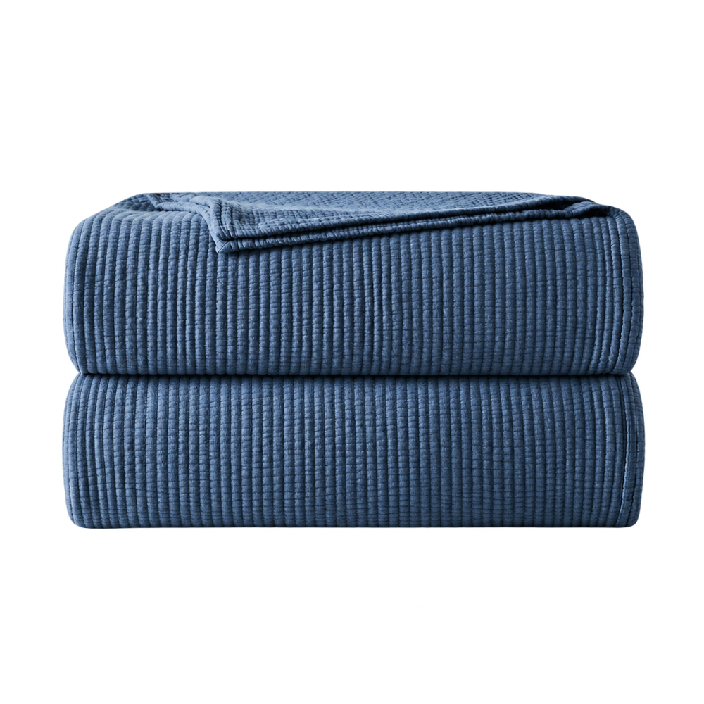 Colcha de algodão com motivo geométrico Cama 90 cm, €79,99, Mango Home
